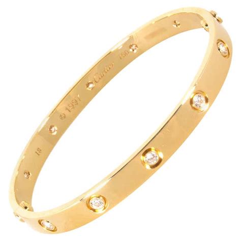 Cartier Love Collection 18 Karat Yellow Gold and 10 Diamond.